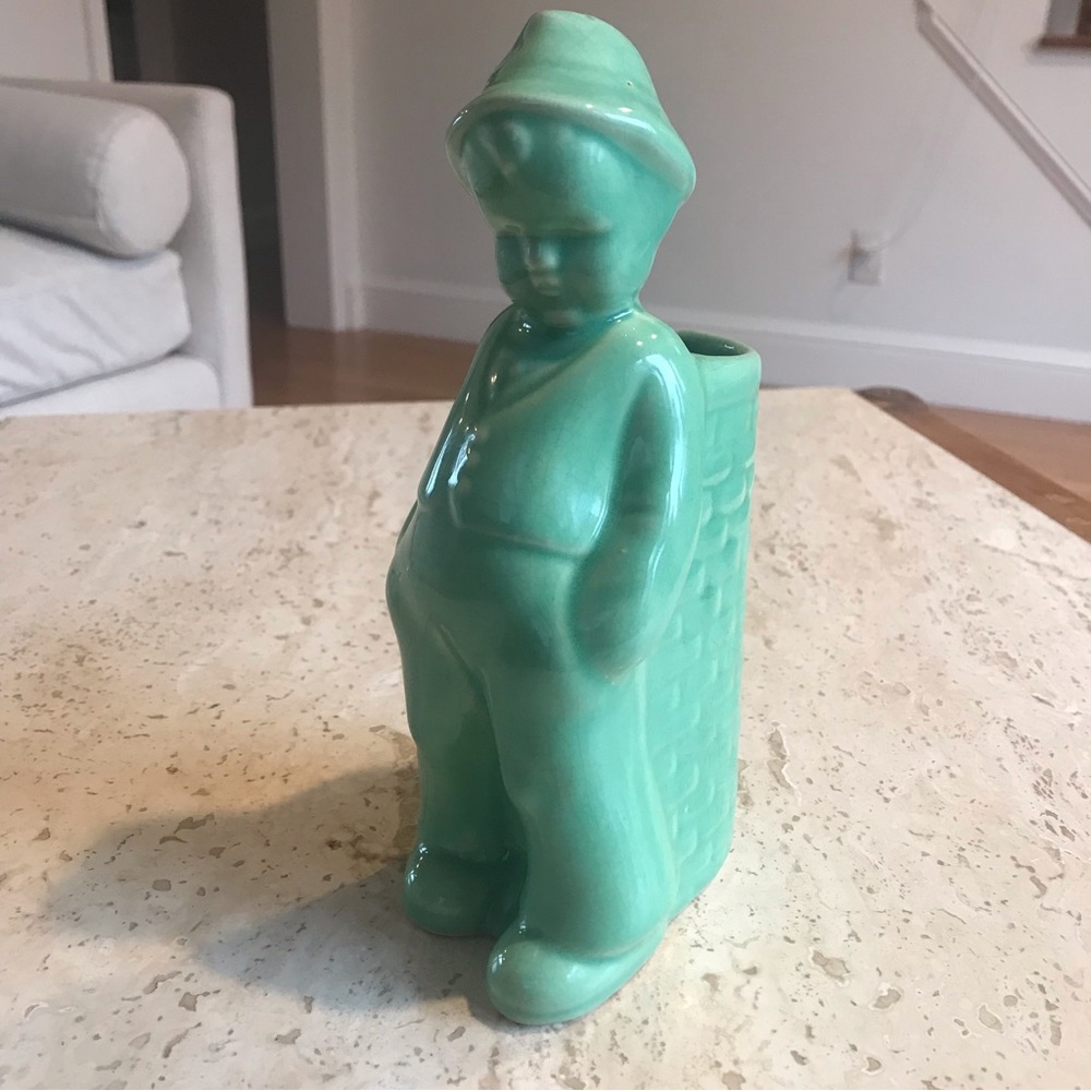 Vintage Little Boy Green Ceramic Planter or Small Vase. Measures 8.5”x4”x3”.